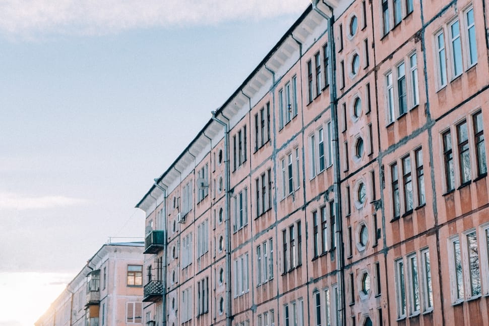 beige low rise buildings with daylight preview