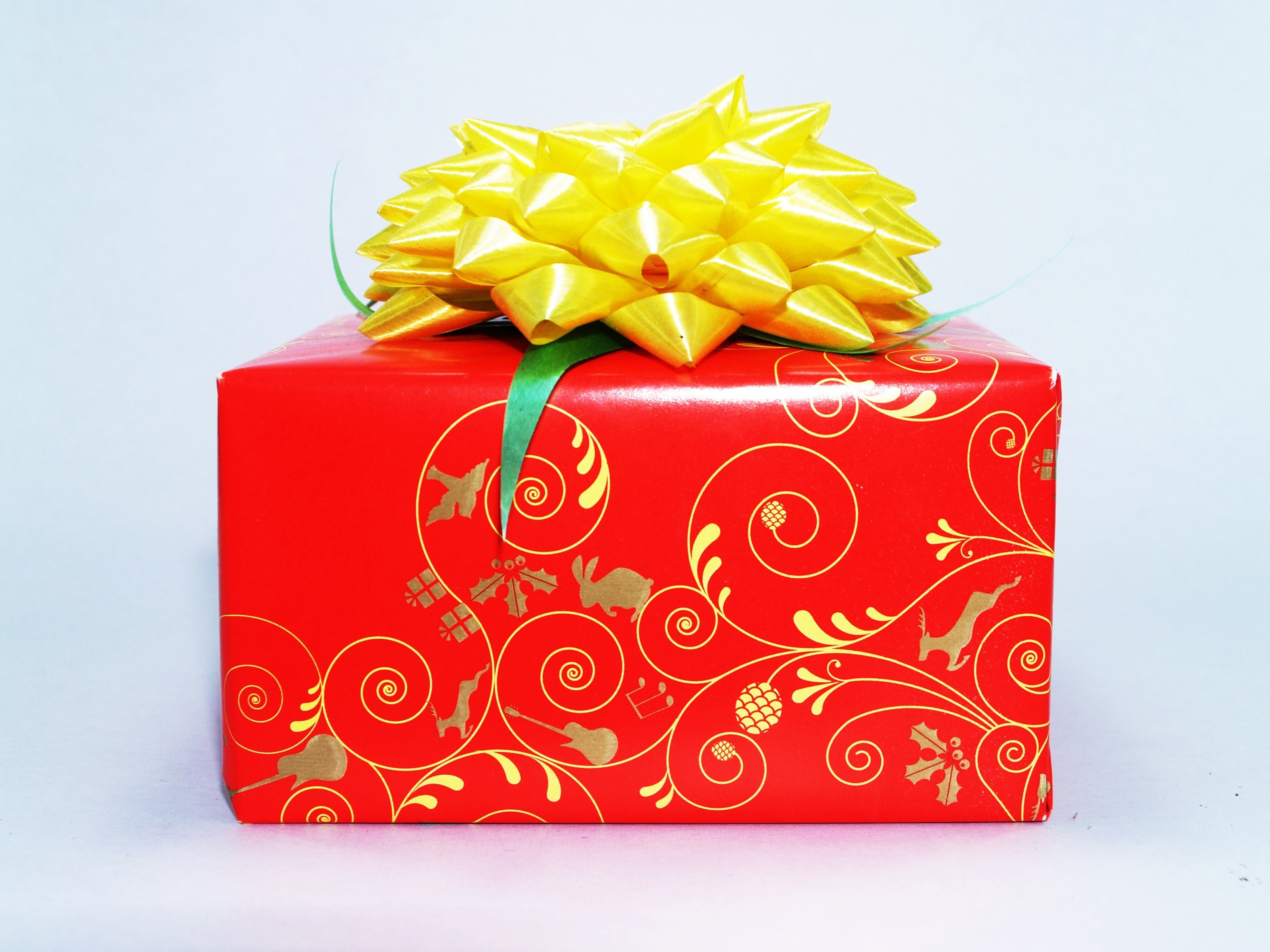 red and yellow scroll gift box