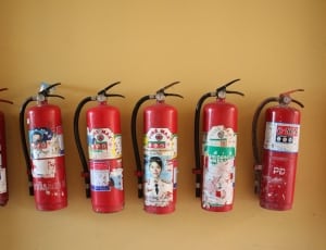 6 red fire extinguishers thumbnail