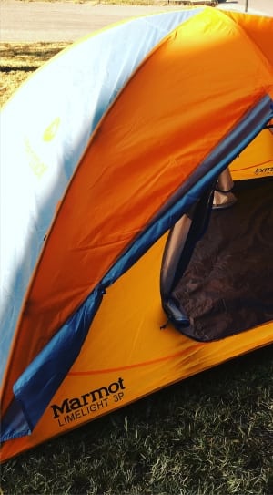 orange and blue marmot camping tent thumbnail