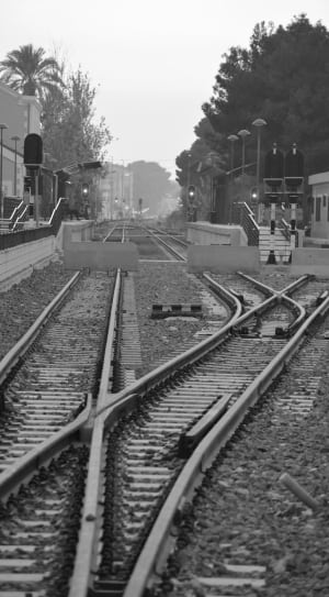 greyscale photo of train railings thumbnail