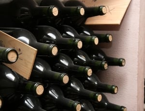wine bottle lot in brown wooden box thumbnail