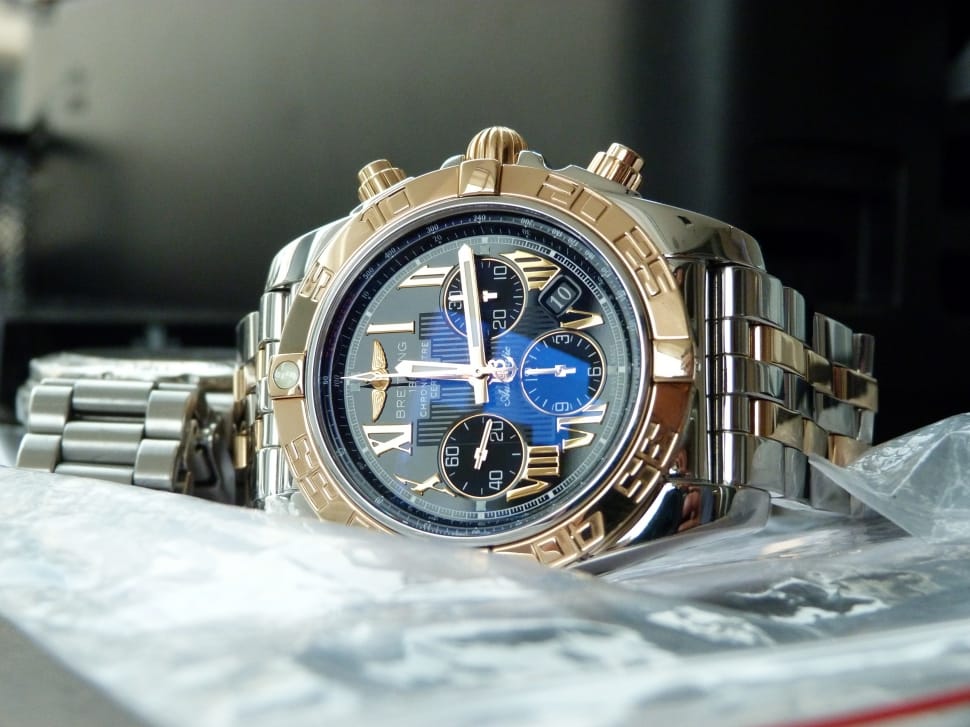 gold and silver 2 toned blue chronograph watch preview