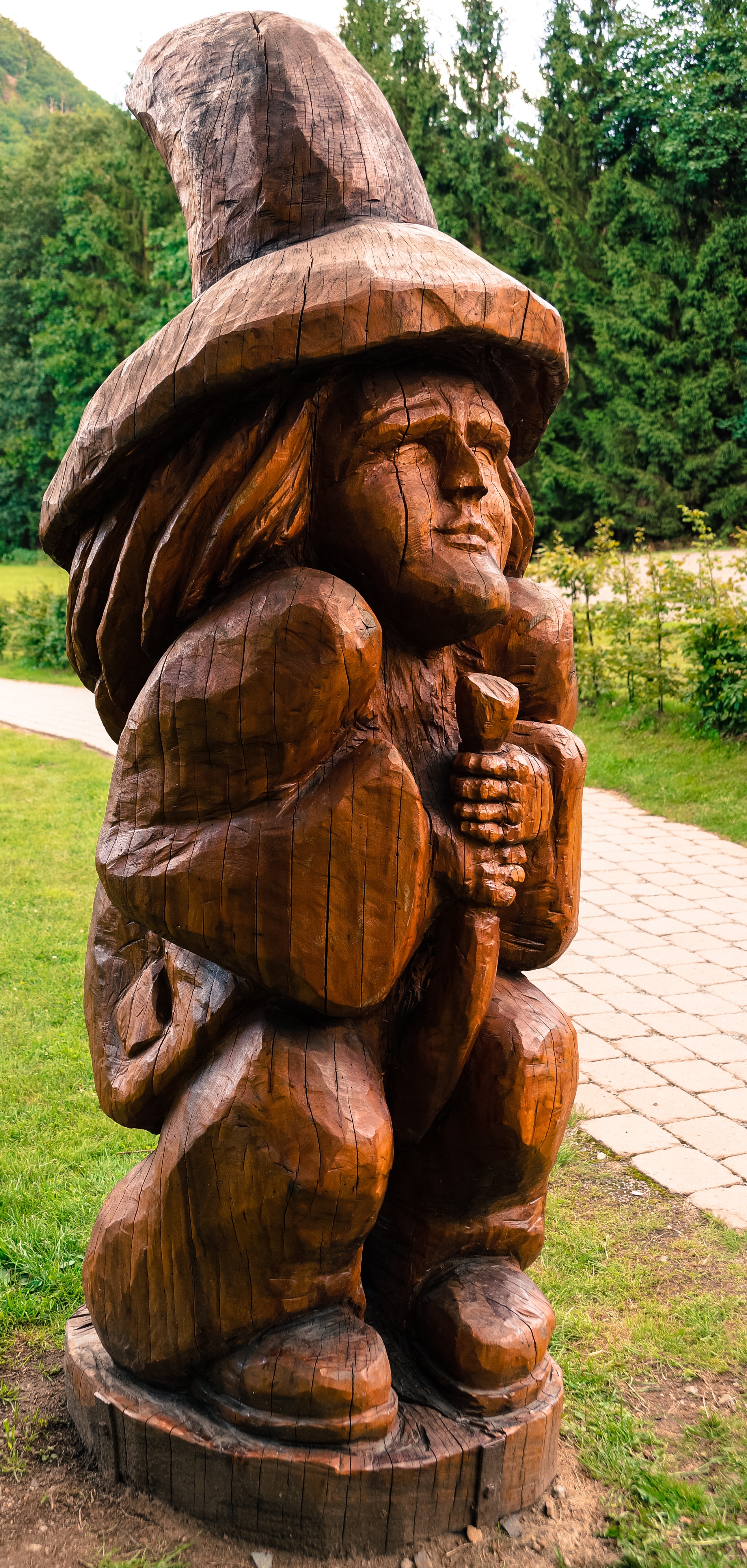 brown wooden man sculpture