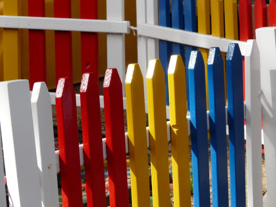 white red yellow and blue wooden fence preview