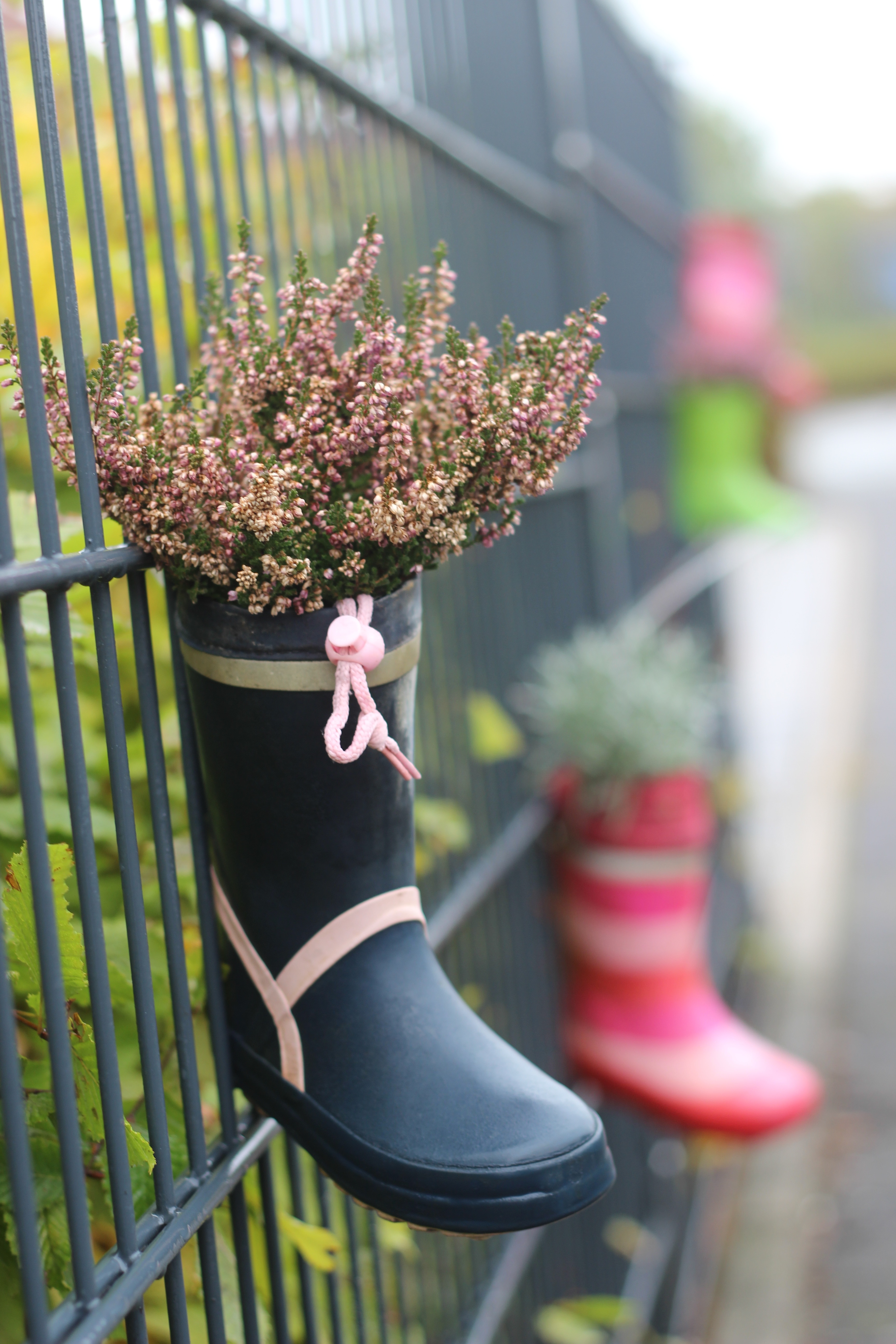 black boot with red flower
