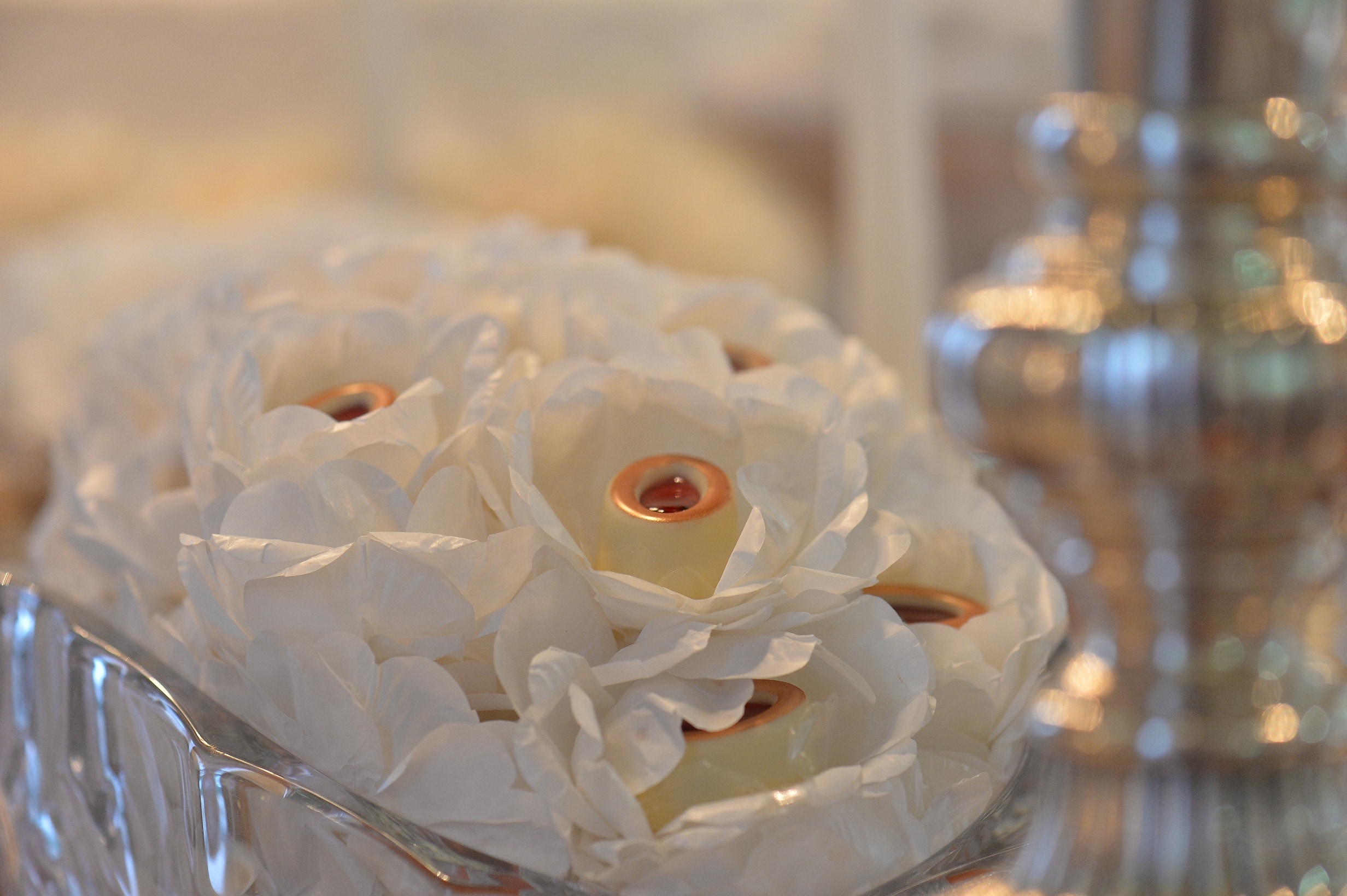 white flower ornament on clear glass bowl