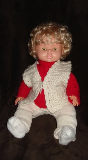 blonde haired plastic doll thumbnail