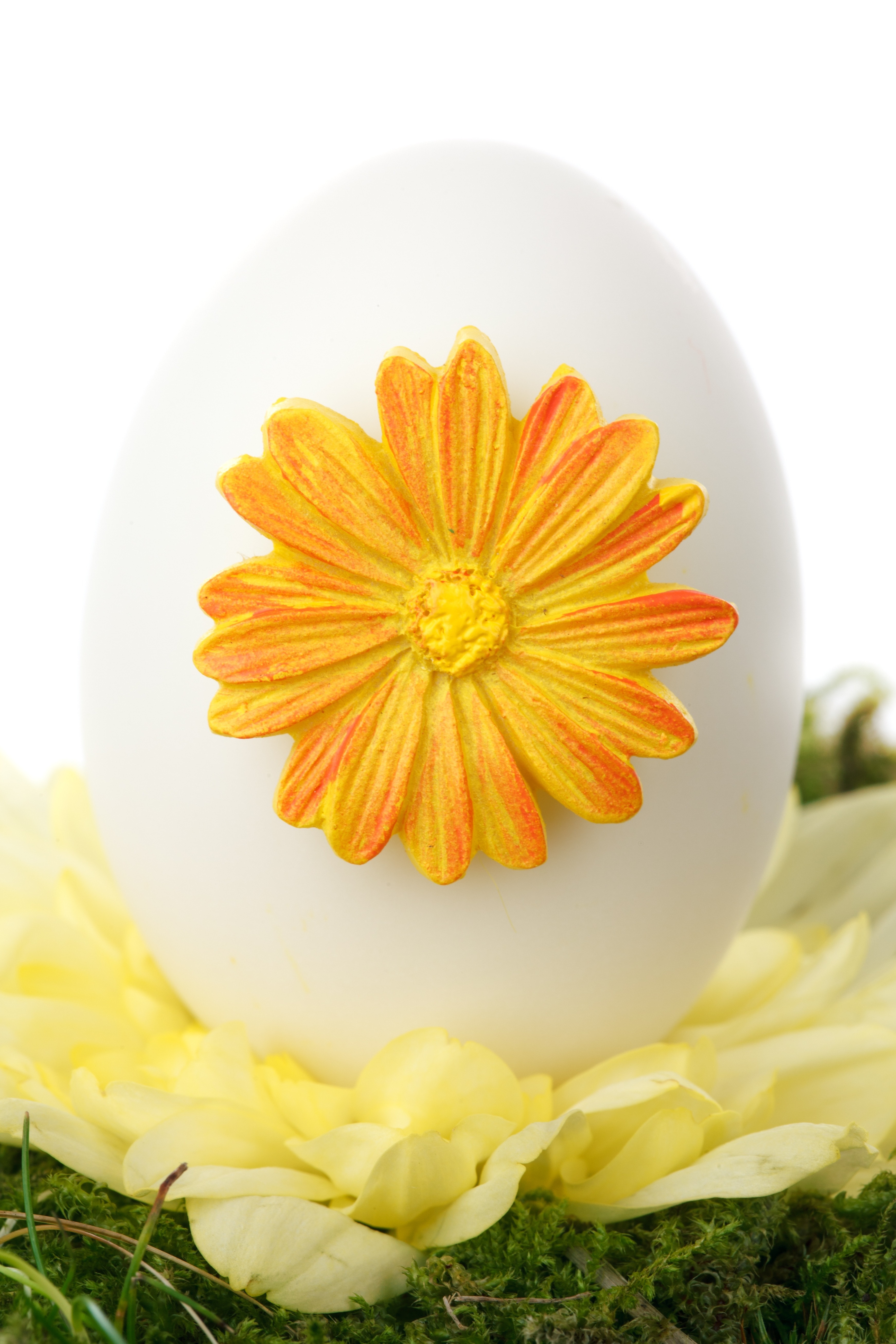 white egg with yellow flower decor