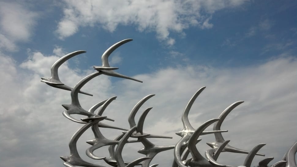 flock of white birds statue preview