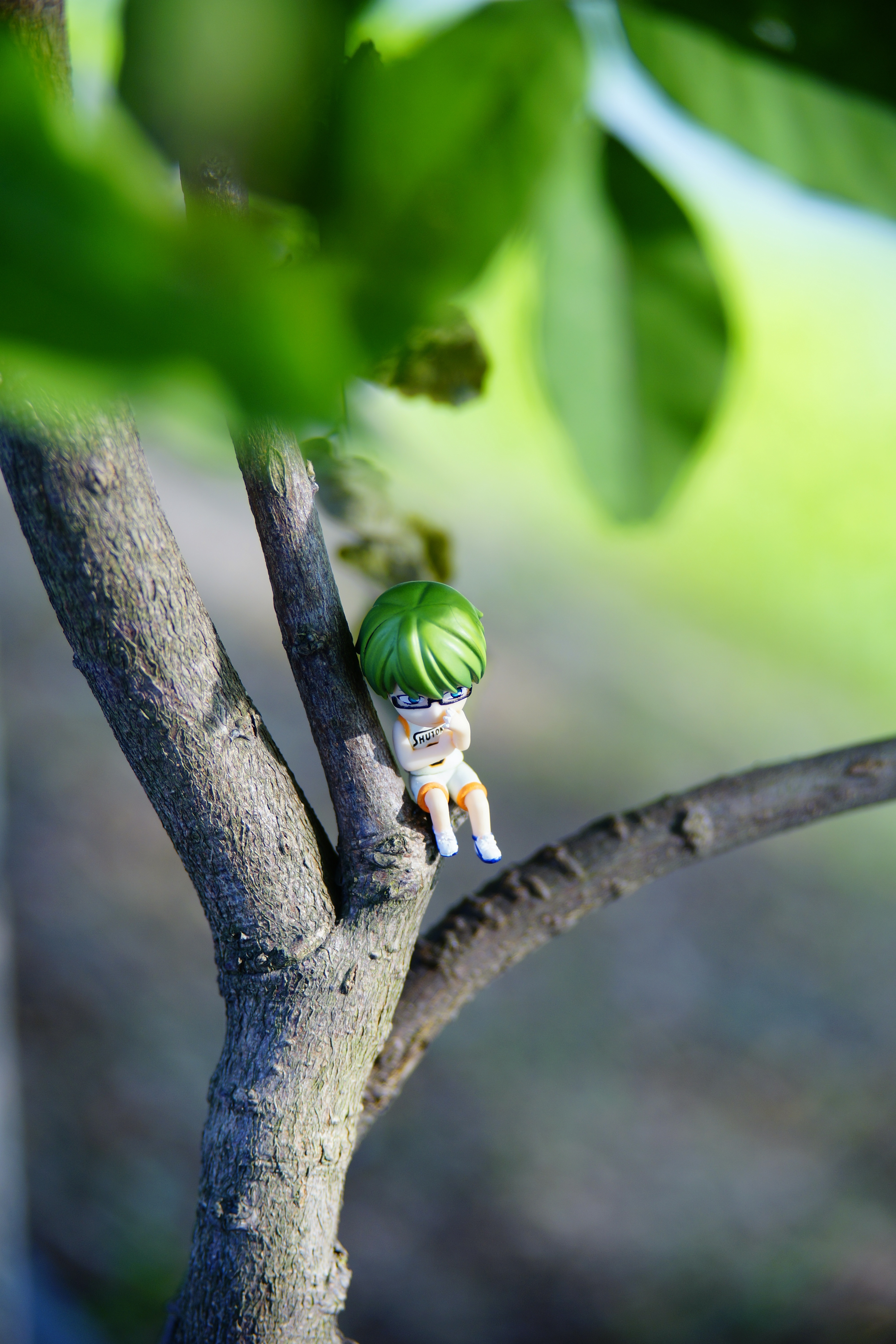 green haired anime character mini figure