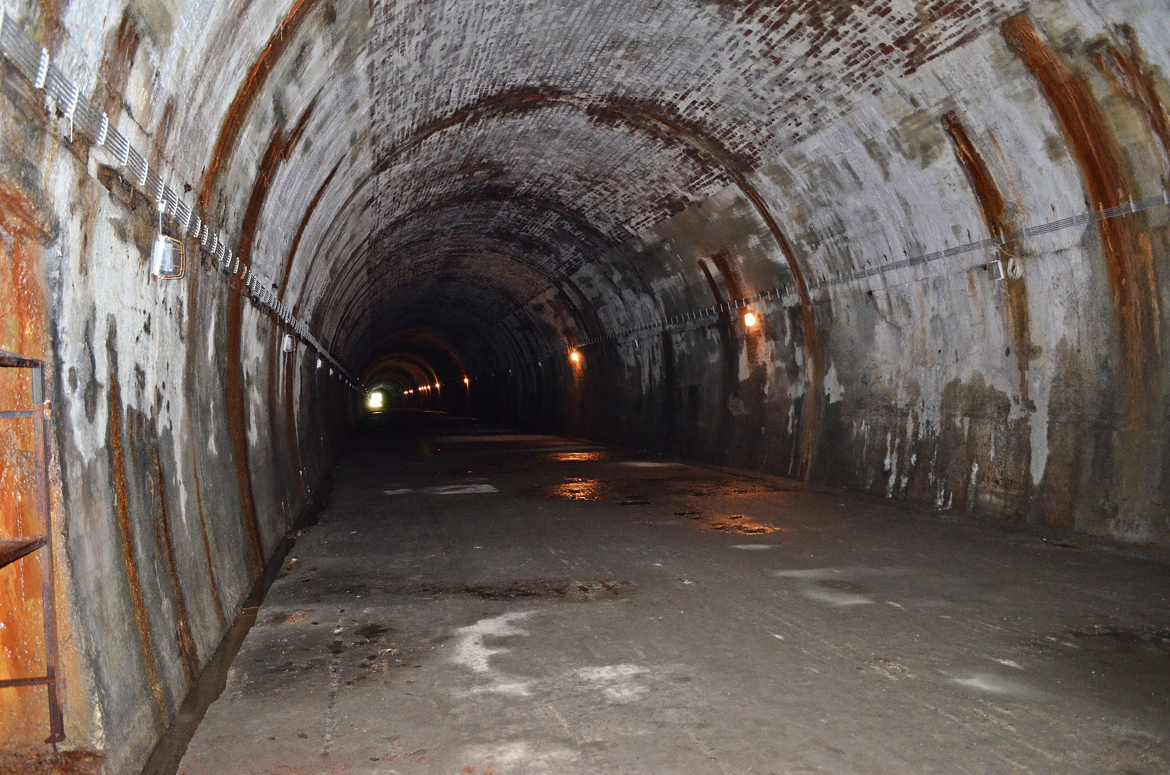white brown and gray concrete tunnel