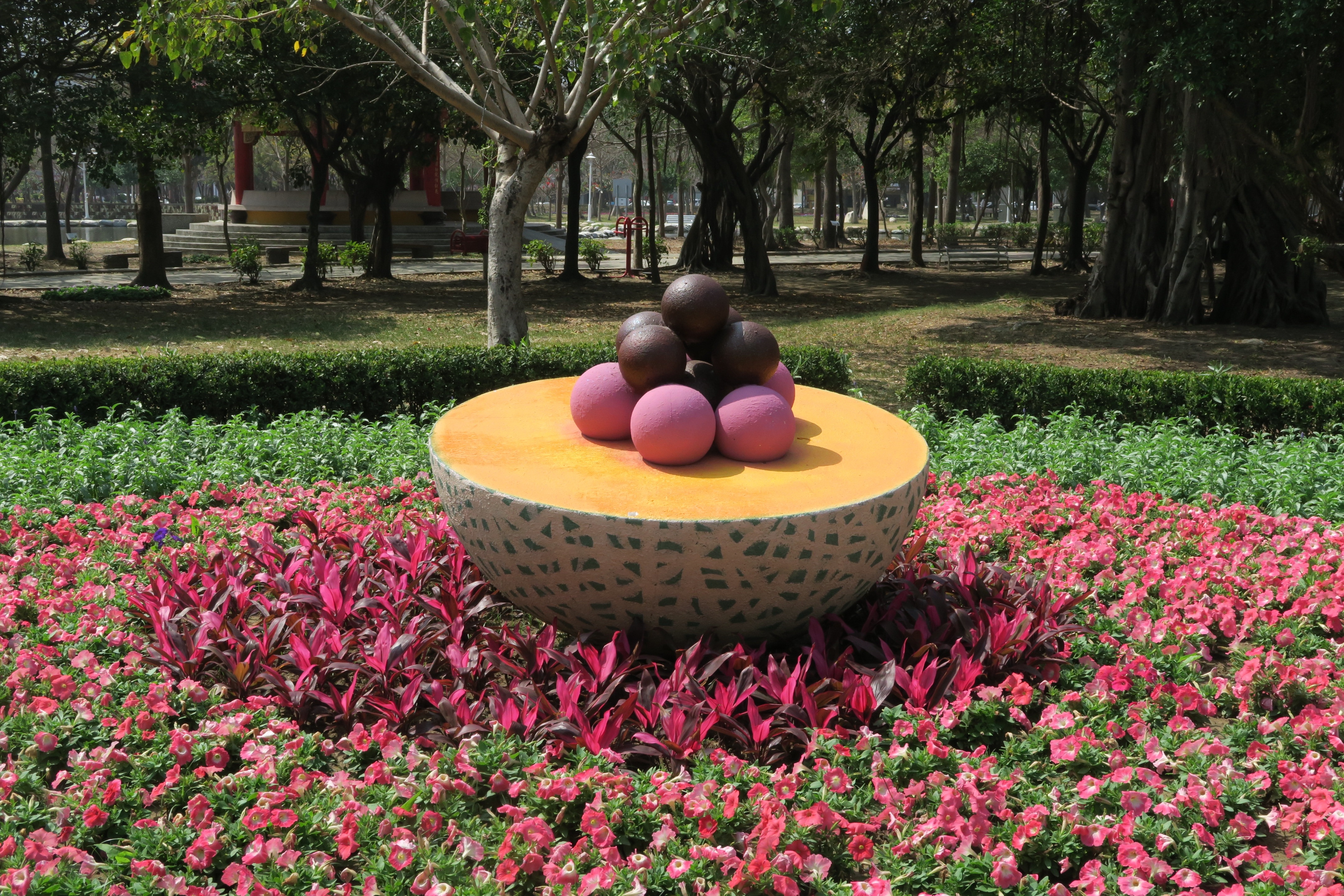 brown round table in tha middle of flower field