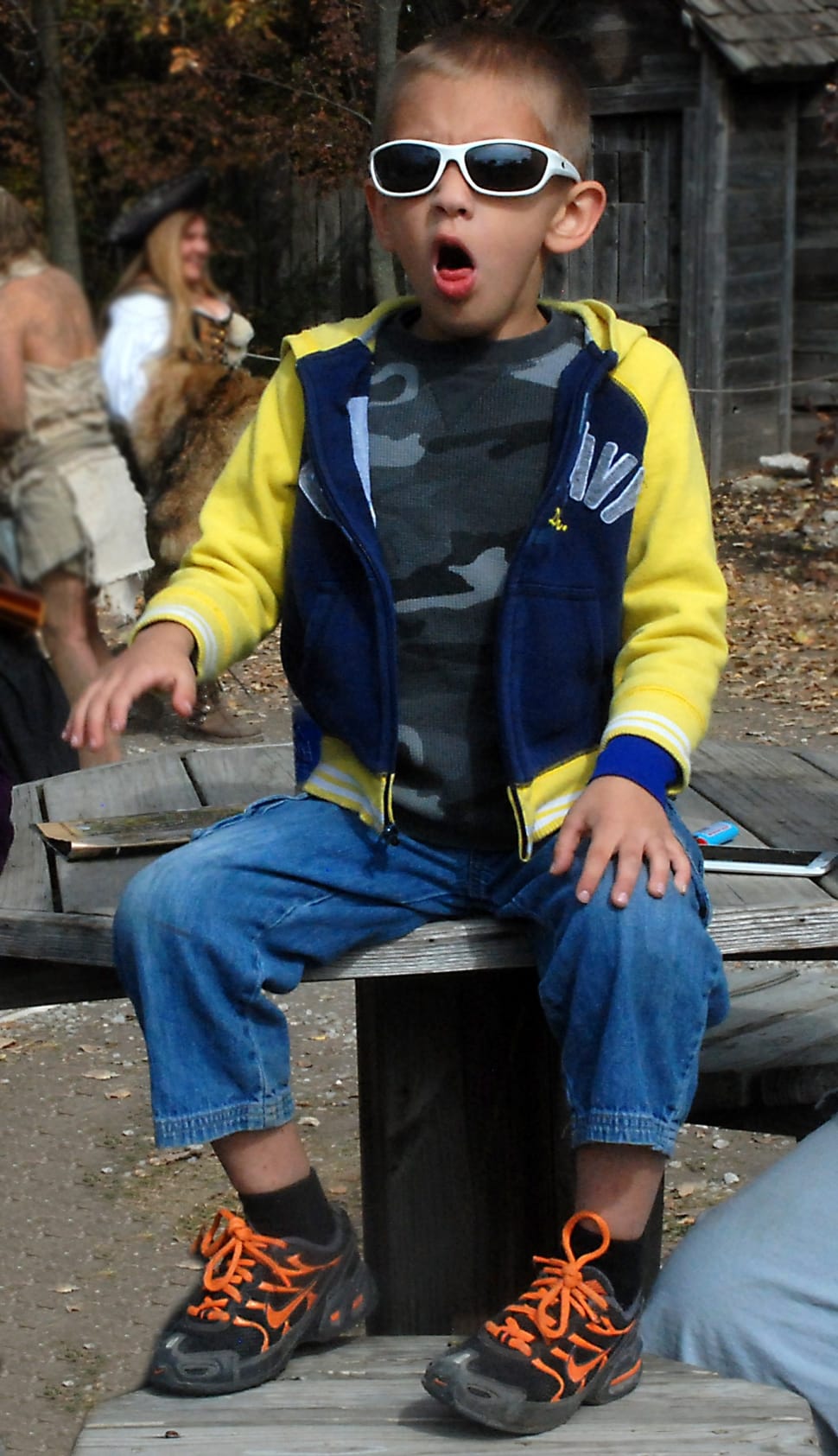 boy's blue yellow letterman jacket blue jeans and black nike sneakers outfit  free image | Peakpx
