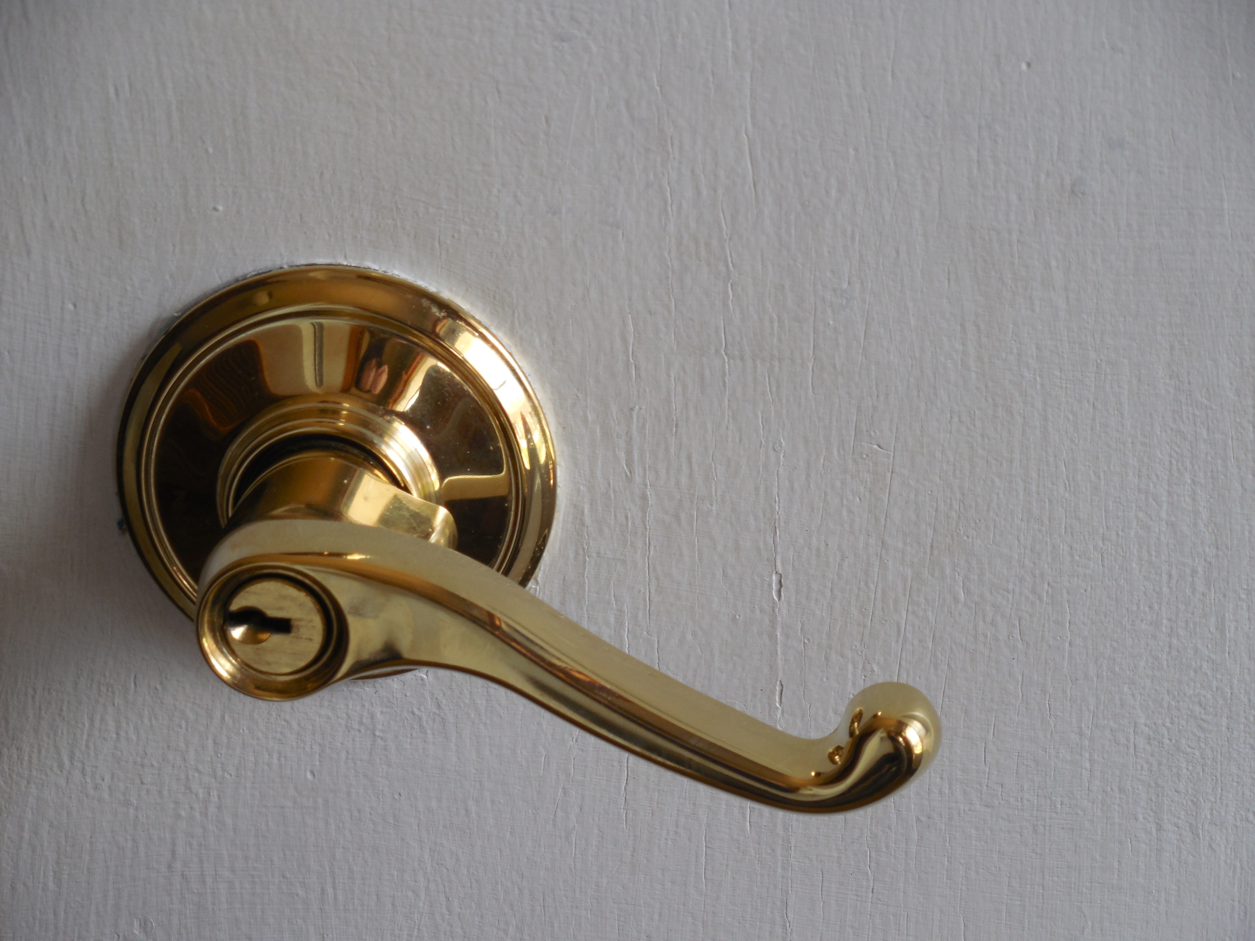 gold plated metal lever door knob