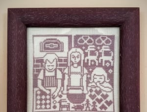 brown wooden framed knit textile and 3 person thumbnail