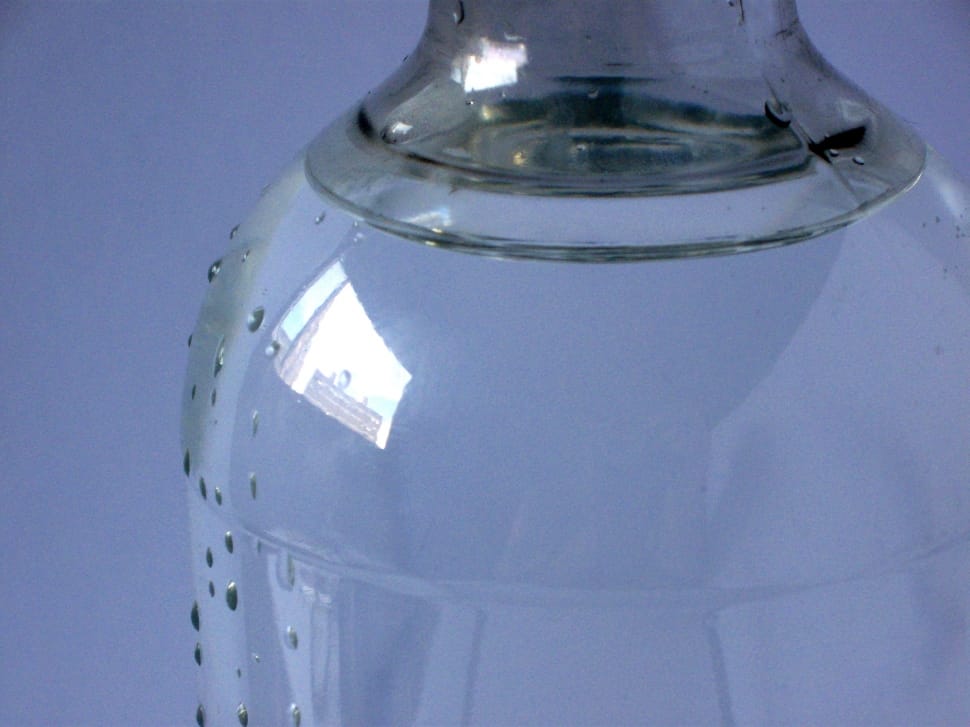 clear glass container filled with water preview