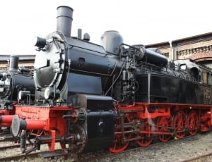 red and black steam train thumbnail