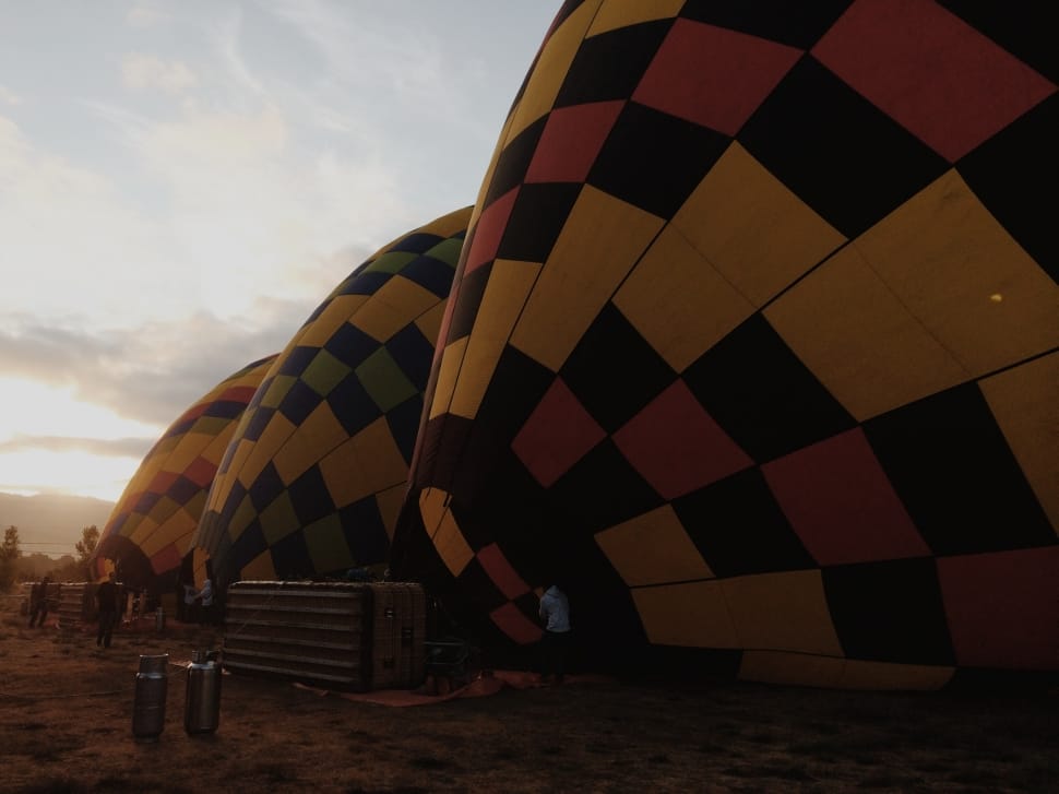 3 yellow black and red hot air balloons preview