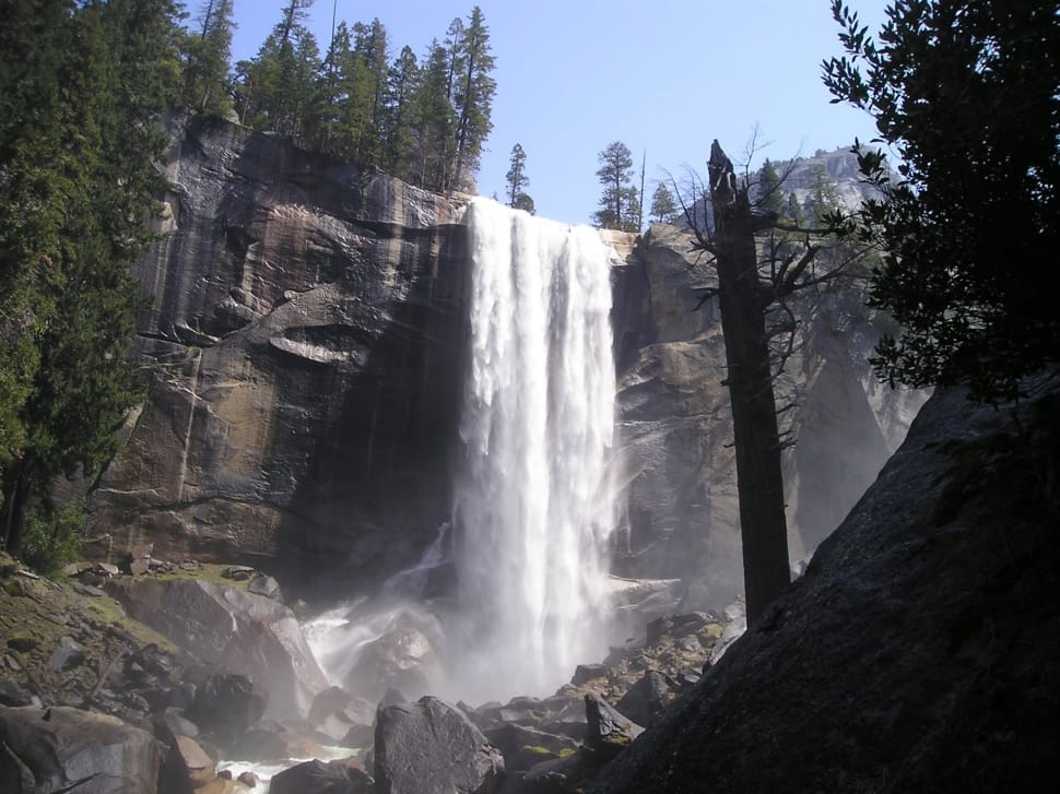 gray mountain with green trees and with waterfalls preview