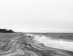 body of water in grayscale photography thumbnail