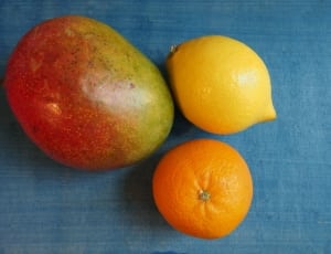 three fruits on blue wooden table thumbnail