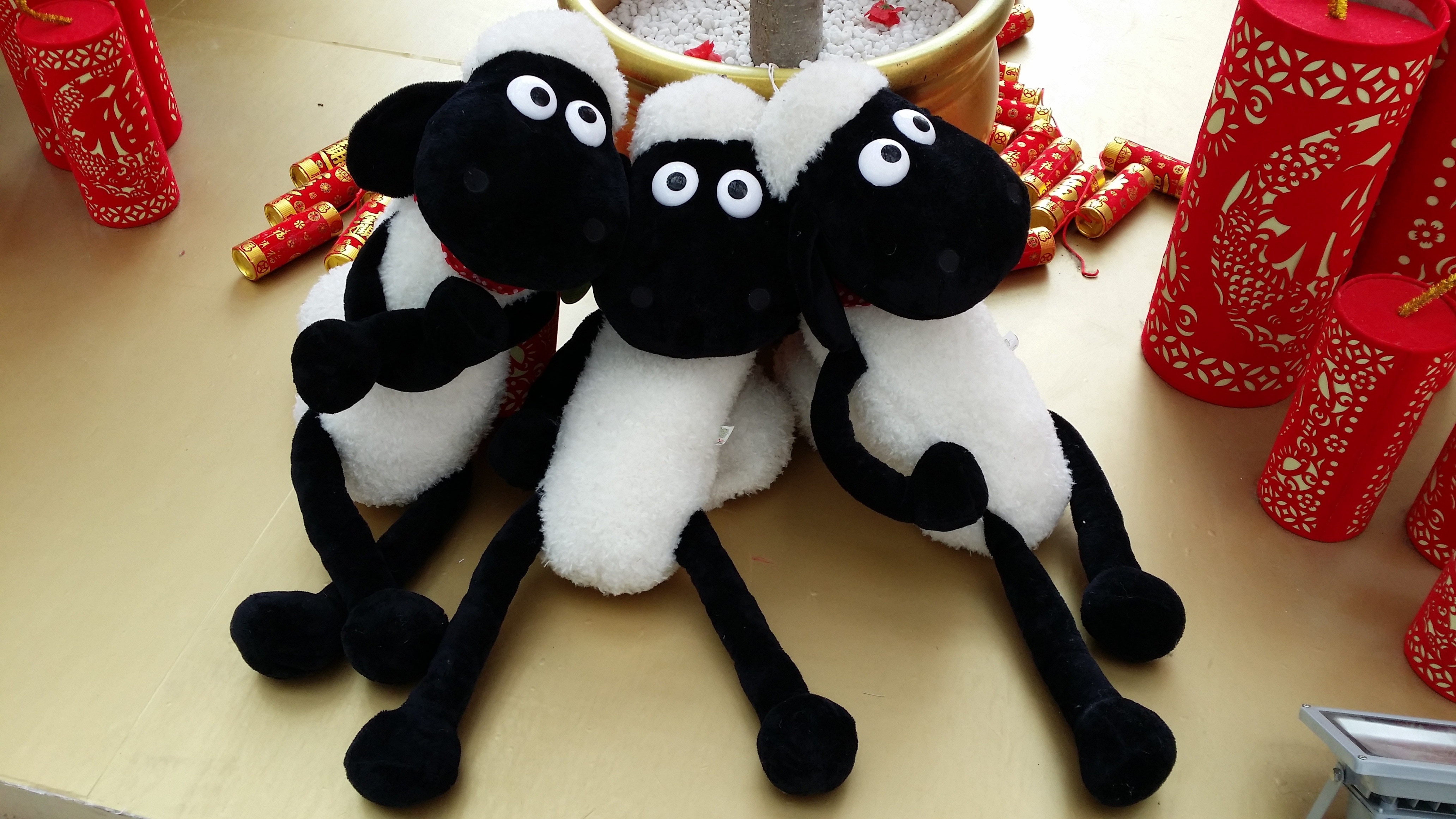 3 white and black llama plush toys