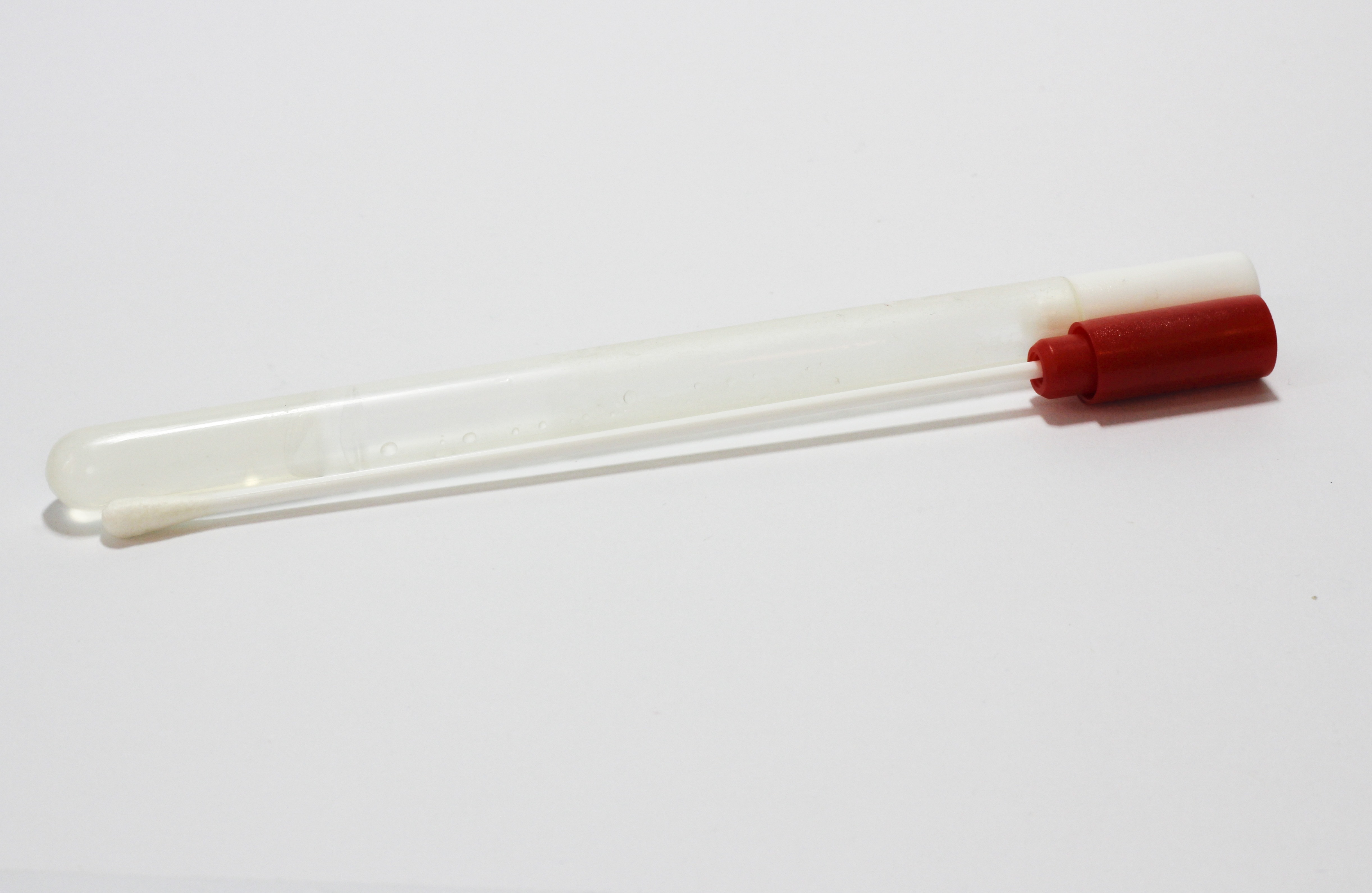 clear and red vial