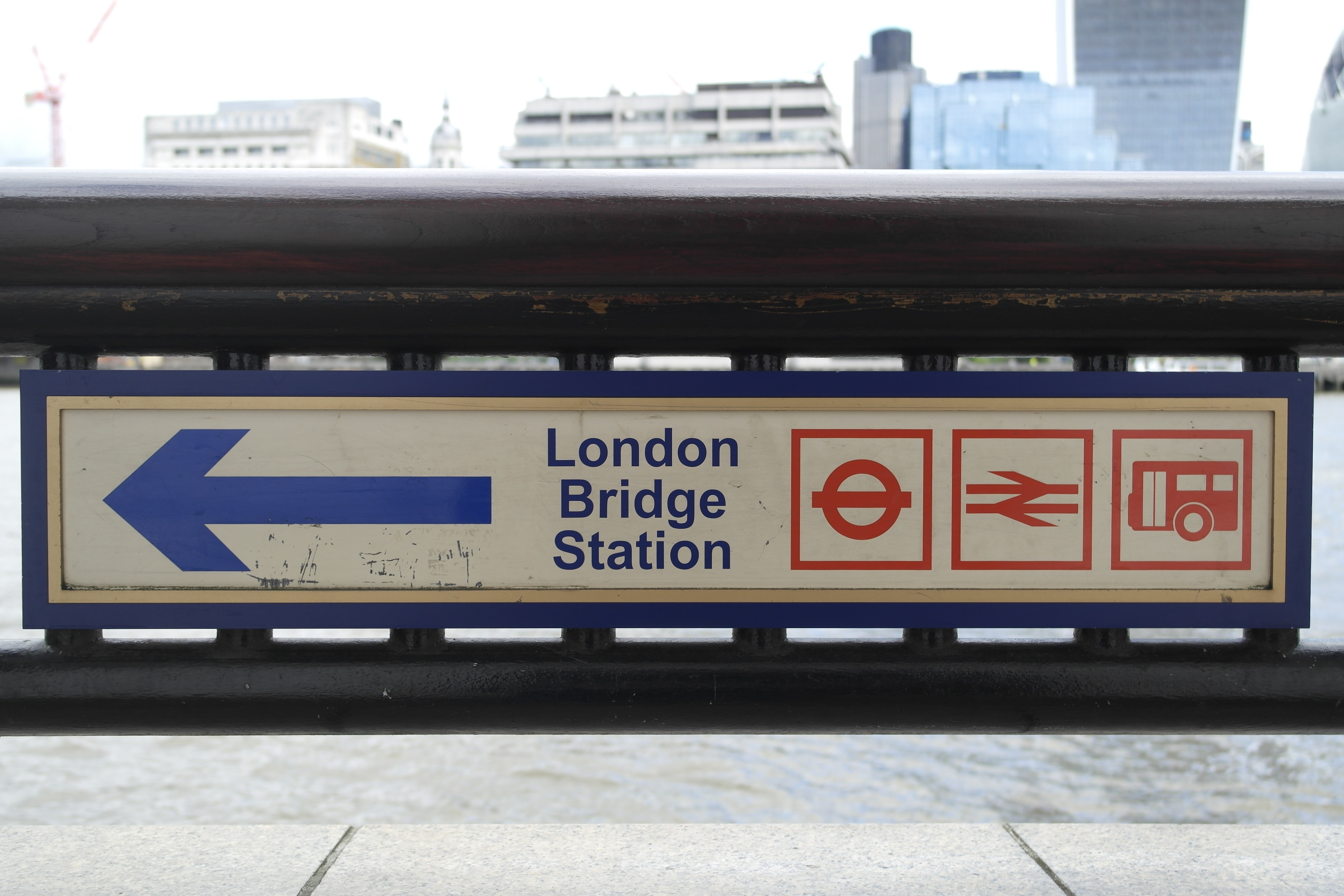 photo of London bridge station to the left sign