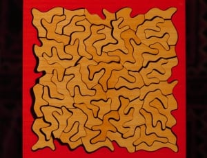 brown and red puzzle illustration thumbnail