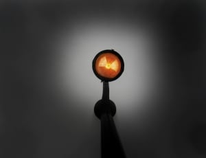black and orange lighted round ornament thumbnail