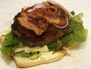 burger with vegetables and bacon topping thumbnail