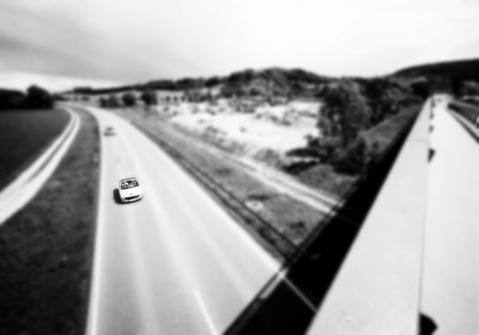 selective focus time lapse photo of car on the road preview