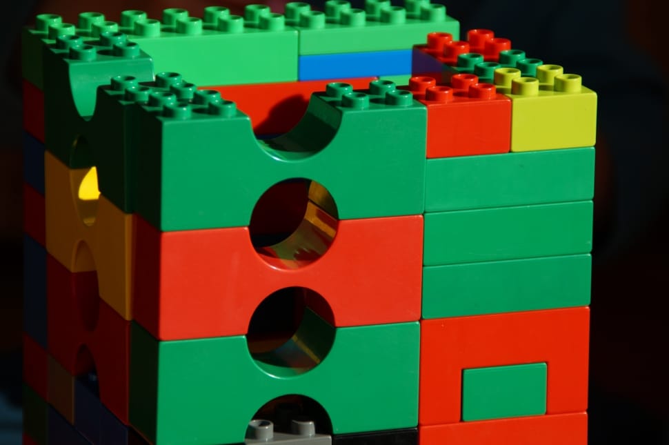 green red and yellow plastic lego block preview