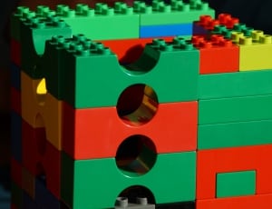 green red and yellow plastic lego block thumbnail