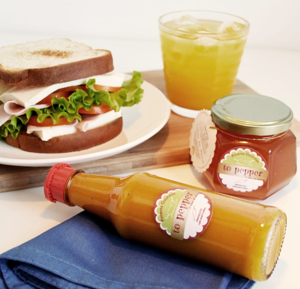 bacon sandwich with juice and to pepper sauce bottle preview