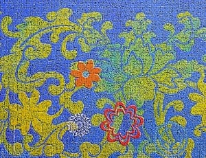 blue orange and green floral textile thumbnail