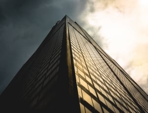 clear glass walled high rise building during golden hour thumbnail