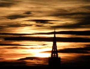 silhouette of cathedral during sunset thumbnail