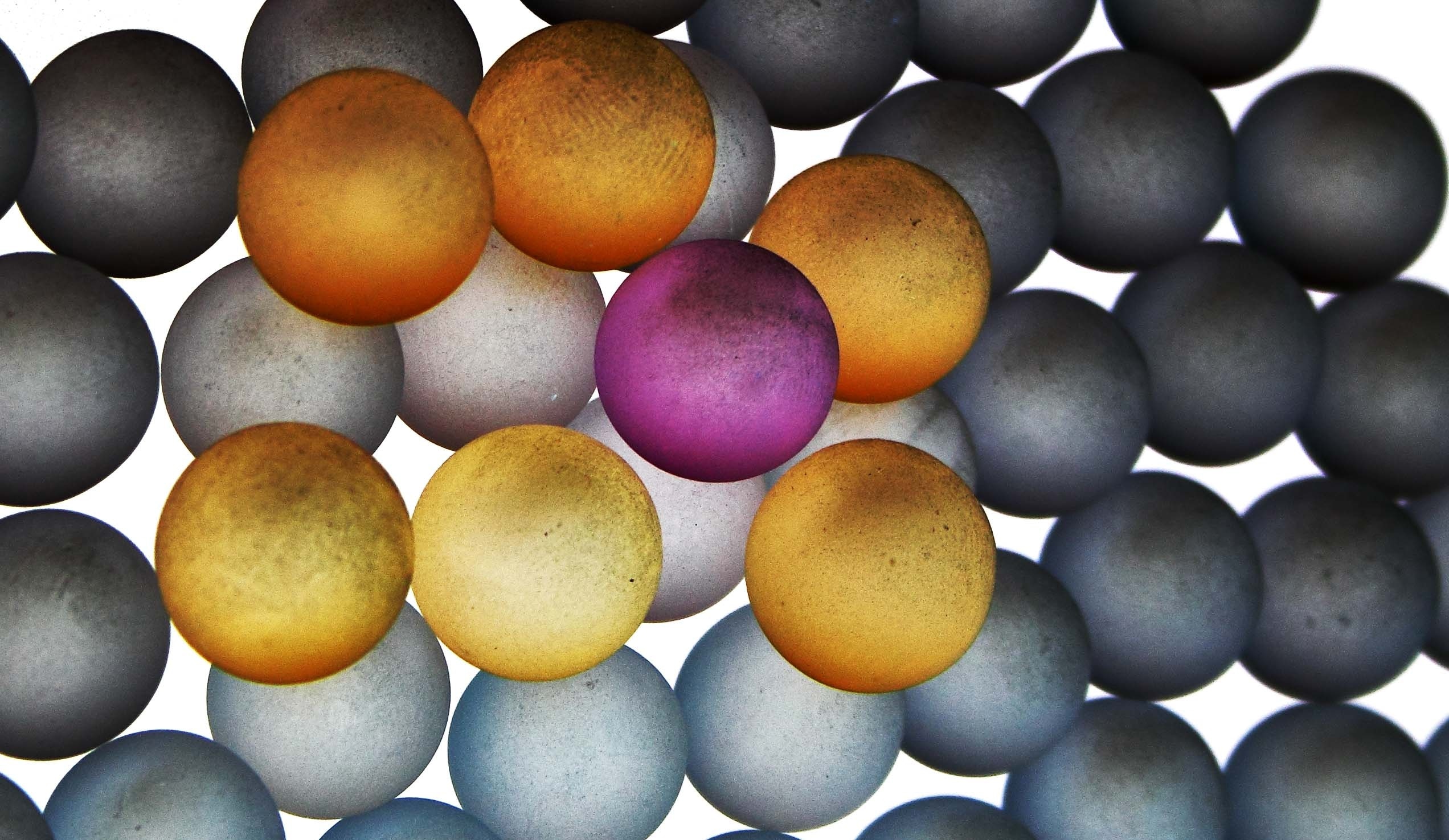 purple yellow and grey balls