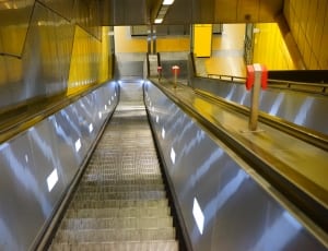 gray and white escalator thumbnail