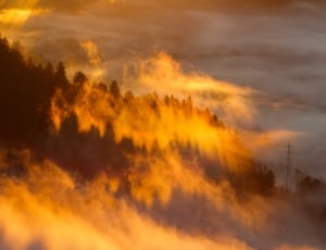 cloudy mountain during golden hour thumbnail