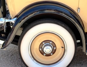 white and brown car wheel thumbnail