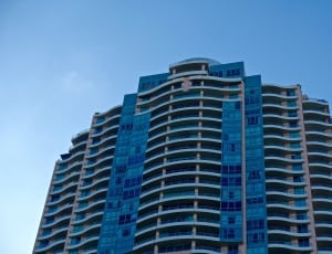 blue and brown concrete high rise building thumbnail