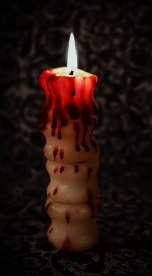 white and red candle thumbnail