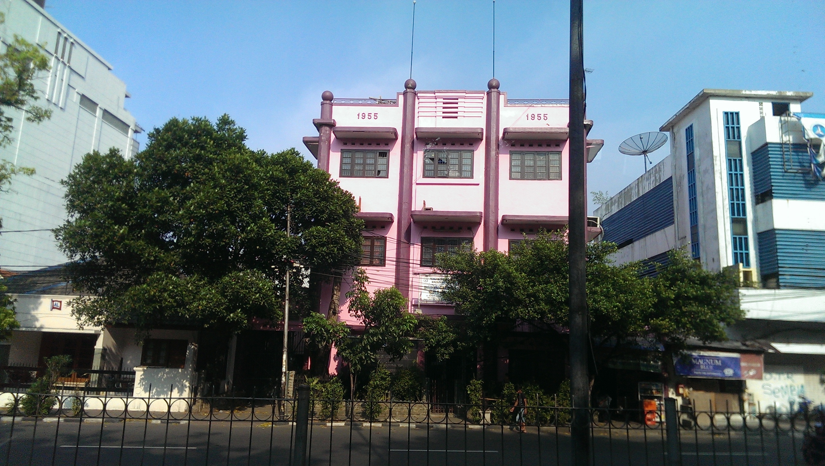 pink and white 2 storey building