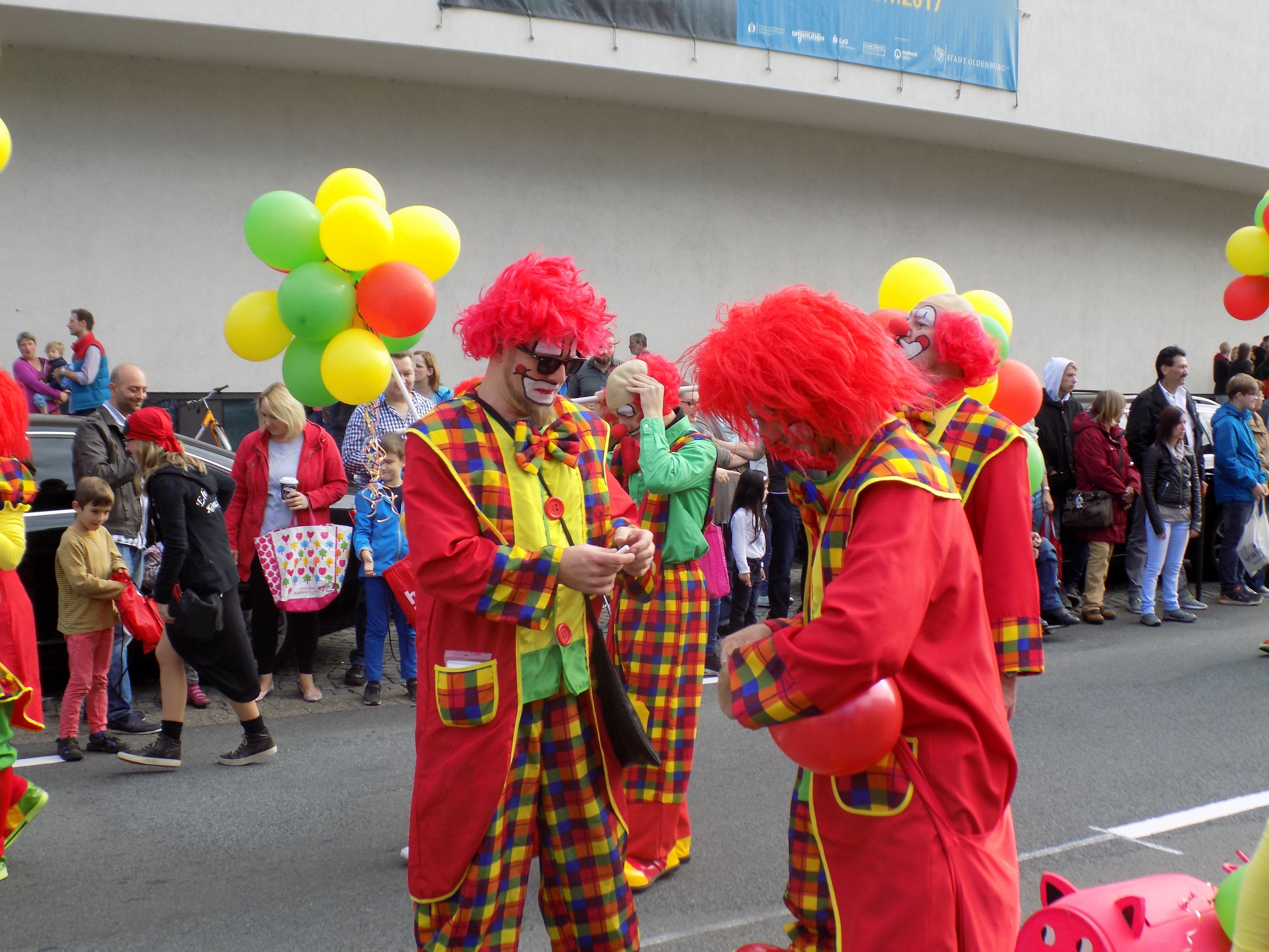 man in red clown costume