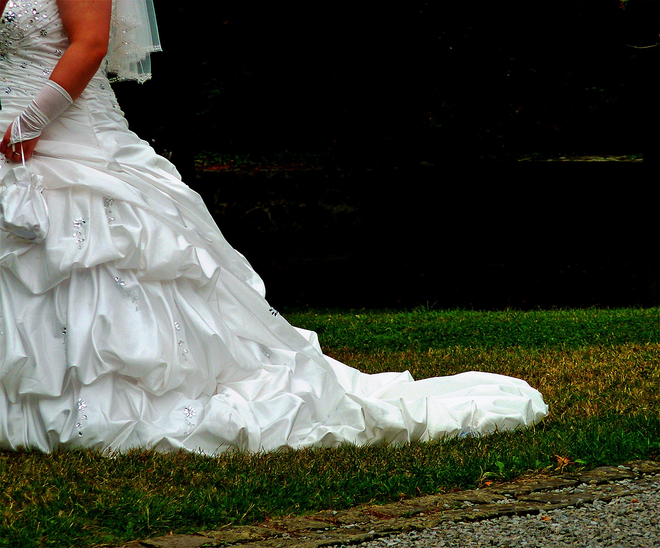 women's white satin ruffle wedding gown