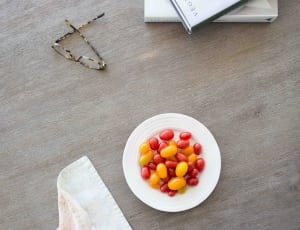 red and yellow beans and white ceramic saucer thumbnail