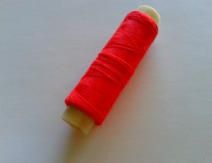 red sewing thread thumbnail
